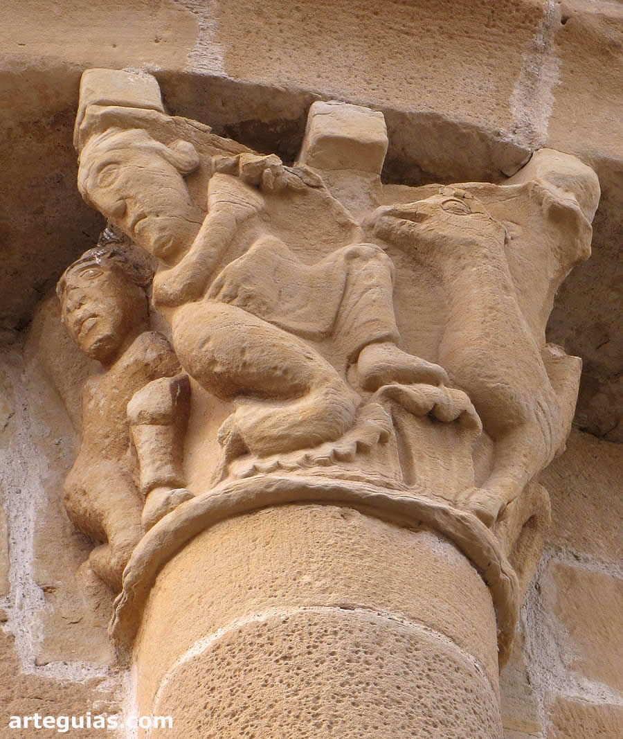 Basilisco atacando a dos hombres