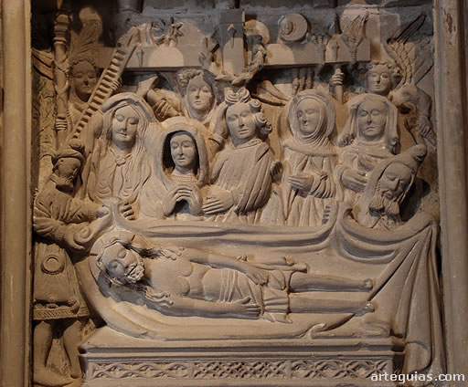 Escena del Retablo del Crucifijo que muestra el entierro de Cristo